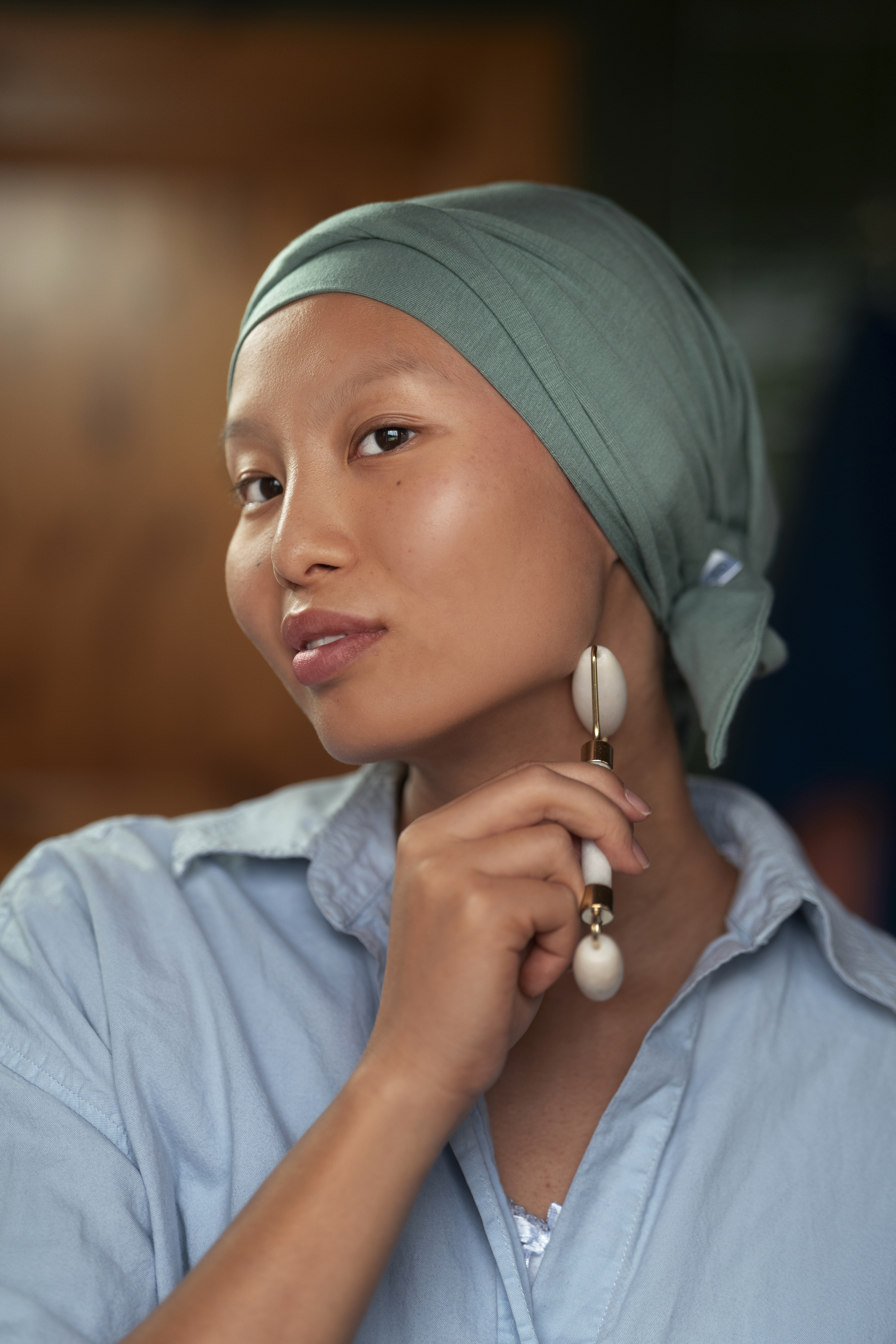 portrait-woman-with-cancer-doing-her-skincare-home